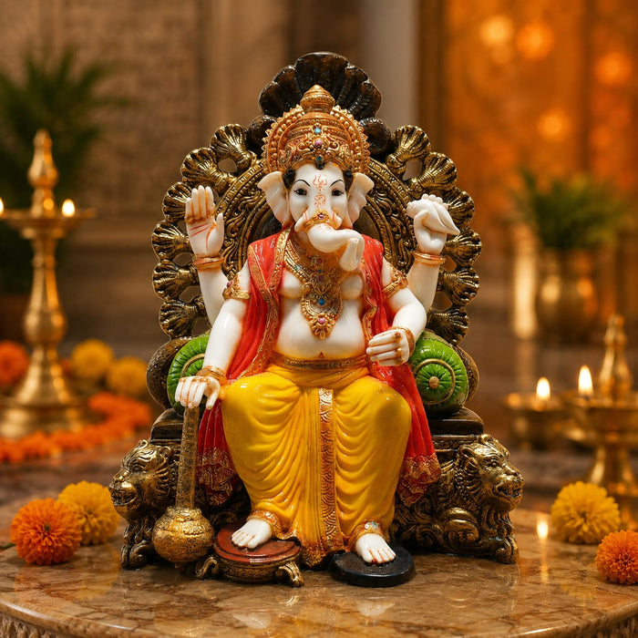 The Multicolour Sitting Ganesha Idol beautifully styled in a modern home interior setting to inspire decor placement.