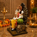 A side profile view of the Multicolour Sitting Ganesha Idol revealing its graceful silhouette.