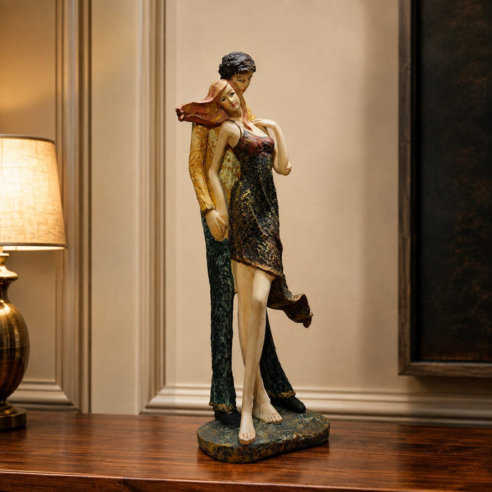 A direct front-facing view of the Multicolour Standing Couple Figurine showcasing its vibrant details and premium finish.