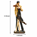 A dimensional diagram illustrating the exact height and width of the Multicolour Standing Couple Figurine.