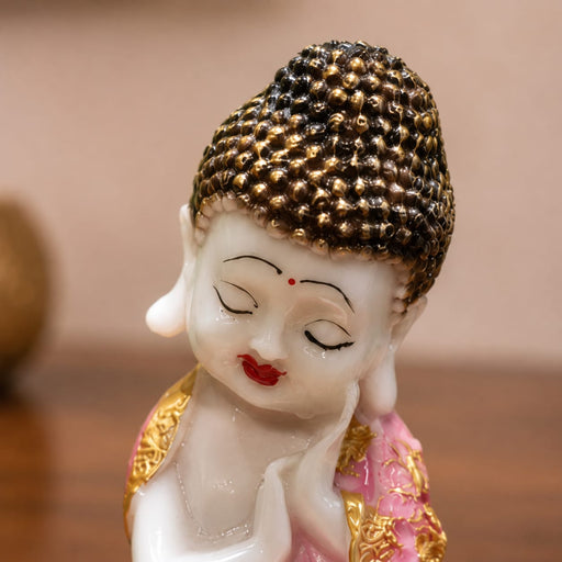 A direct front-facing view of the Pink Little Buddha Figurine showcasing its vibrant details and premium finish.