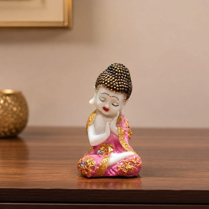 The Pink Little Buddha Figurine beautifully styled in a modern home interior setting to inspire decor placement.