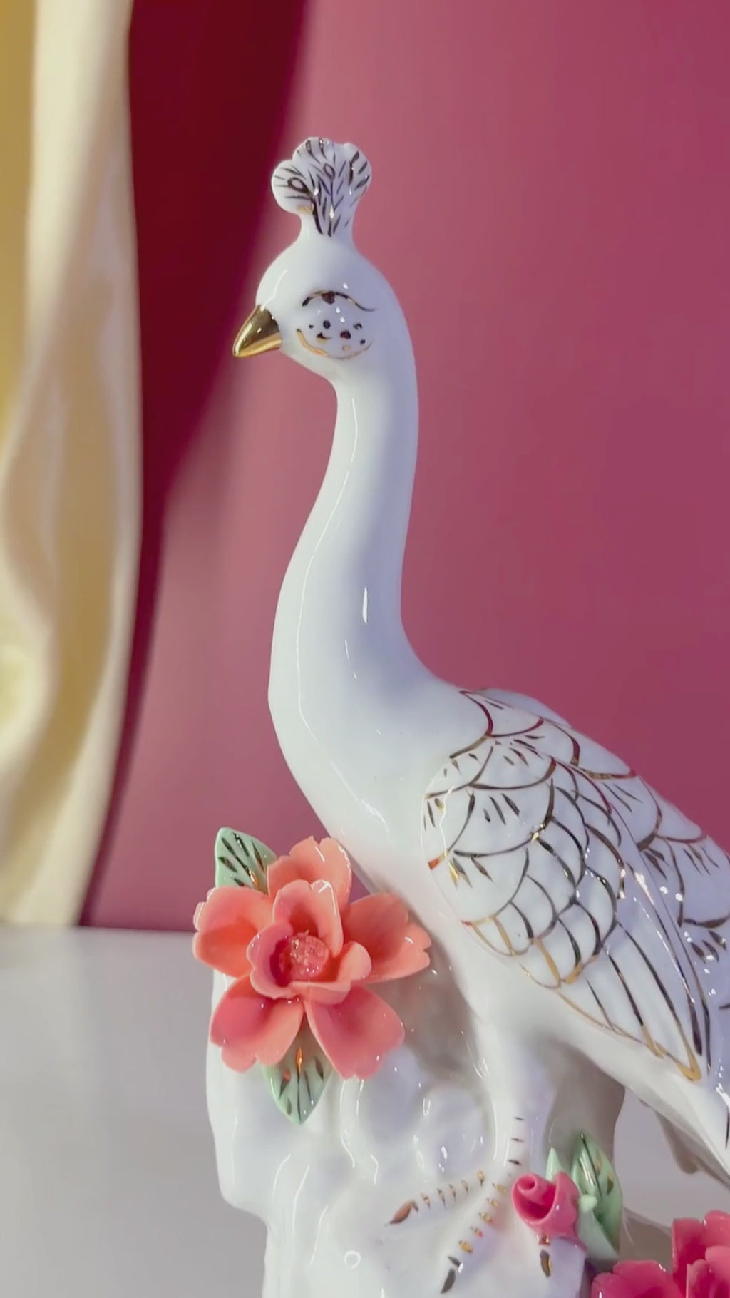 Ceramic peacock showpiece with elegant floral design