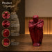 An angled perspective of the Red Abstract Yoga Figurine highlighting its elegant three-dimensional form and craftsmanship.