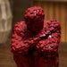 A direct front-facing view of the Red Abstract Yoga Figurine showcasing its vibrant details and premium finish.