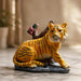 Product feature highlights and craftsmanship overview infographic for Resting Tiger Resin Figurine with Red Roses (7 Inch)