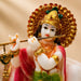 Sacred Lord Krishna & Cow Resin Figurine with Golden Halo (6.6 Inch) - View 1