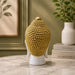 Detailed close-up of hand-painted accents, fine facial detailing, and premium Resin texture on Serene White and Gold Buddha Head Resin Bust (9 Inch)