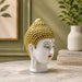 Product feature highlights and craftsmanship overview infographic for Serene White and Gold Buddha Head Resin Bust (9 Inch)