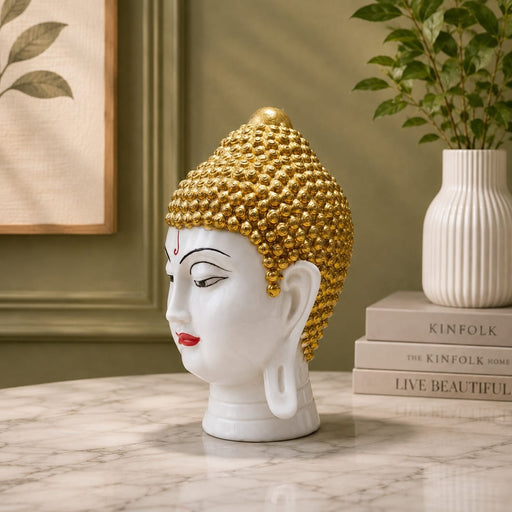 Full front view of Serene White and Gold Buddha Head Resin Bust (9 Inch) on display base against clean studio background