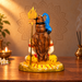 Back view of Shiva idol showing sculpted hair and trident