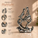 A side profile view of the Silver Abstract Couple Figurine revealing its graceful silhouette.