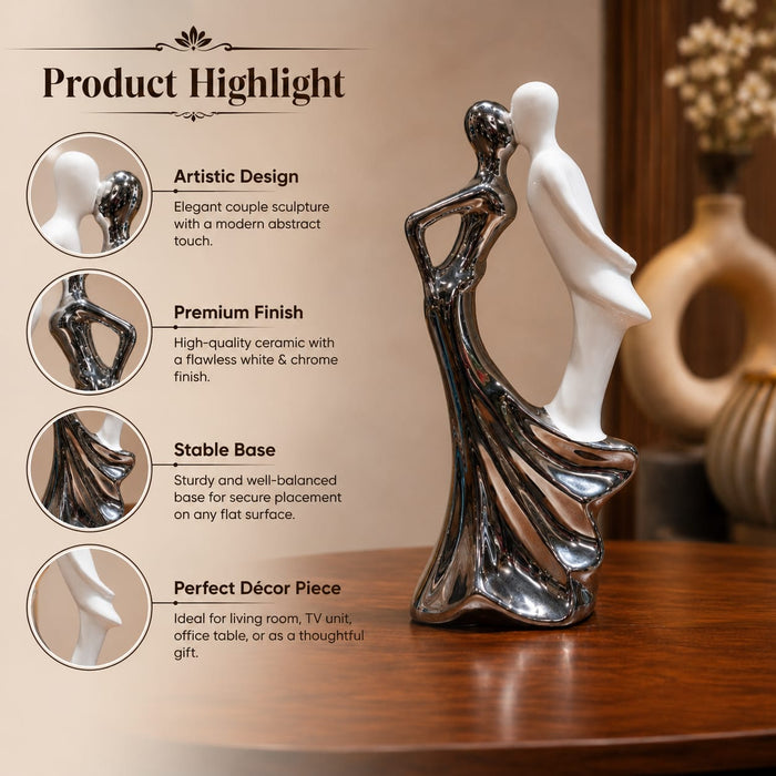 An angled perspective of the Silver Dancing Couple Figurine highlighting its elegant three-dimensional form and craftsmanship.