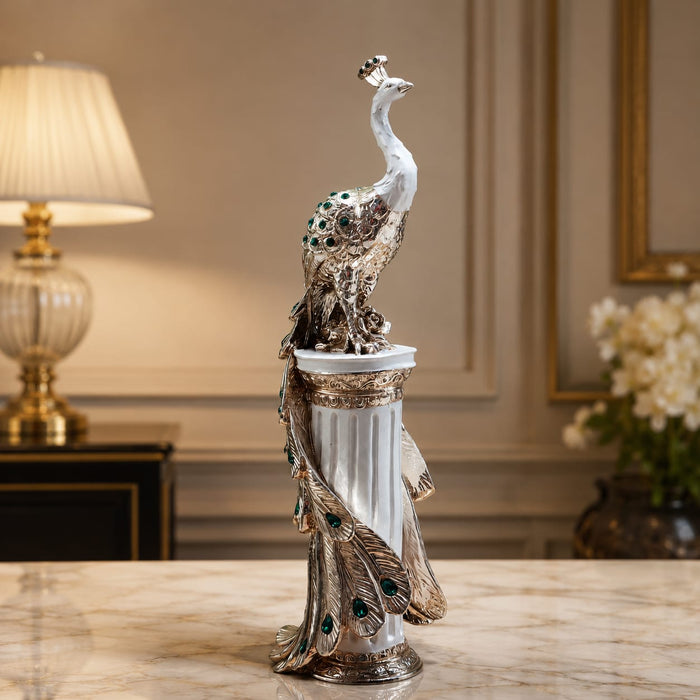 A side profile view of the Silver Peacock on Pillar revealing its graceful silhouette.