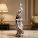 A side profile view of the Silver Peacock on Pillar revealing its graceful silhouette.