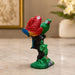 Three-quarter perspective angle view showcasing dynamic form and balanced proportions of Vibrant Red and Green Macaw Parrots Resin Figurine (8.2 Inch)