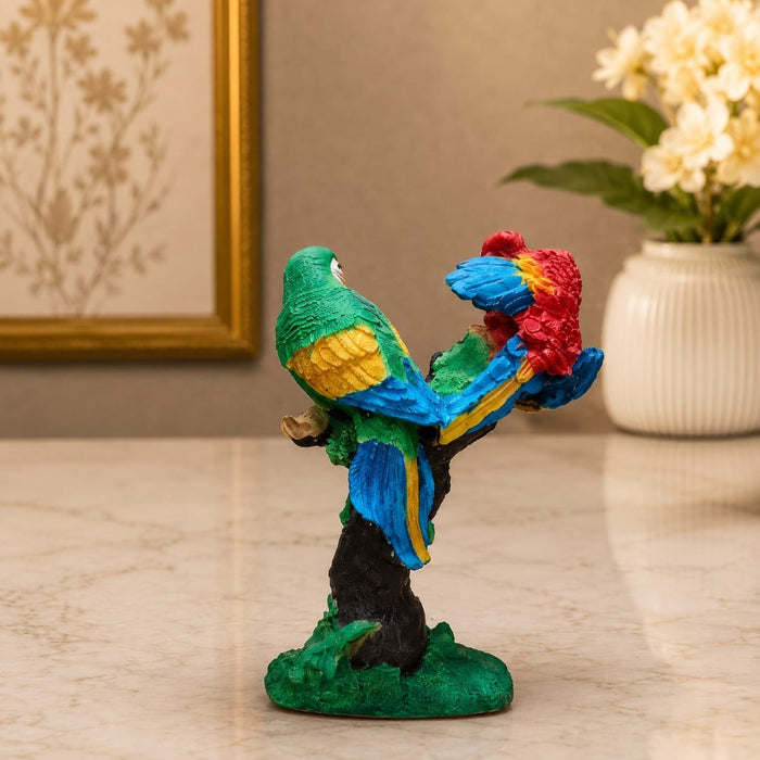 Detailed close-up of hand-painted accents, fine facial detailing, and premium Resin texture on Vibrant Red and Green Macaw Parrots Resin Figurine (8.2 Inch)