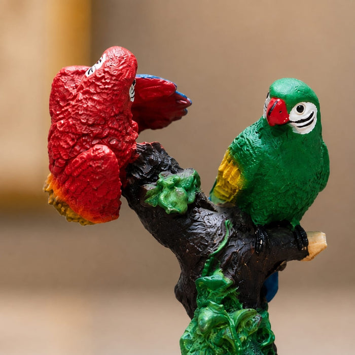 Full front view of Vibrant Red and Green Macaw Parrots Resin Figurine (8.2 Inch) on display base against clean studio background
