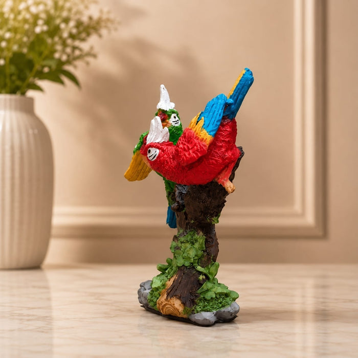 Side profile perspective showcasing elegant three-dimensional contours and sculptural depth of Vibrant Twin Parrots on Branch Resin Figurine (8 Inch)