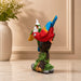 Side profile perspective showcasing elegant three-dimensional contours and sculptural depth of Vibrant Twin Parrots on Branch Resin Figurine (8 Inch)