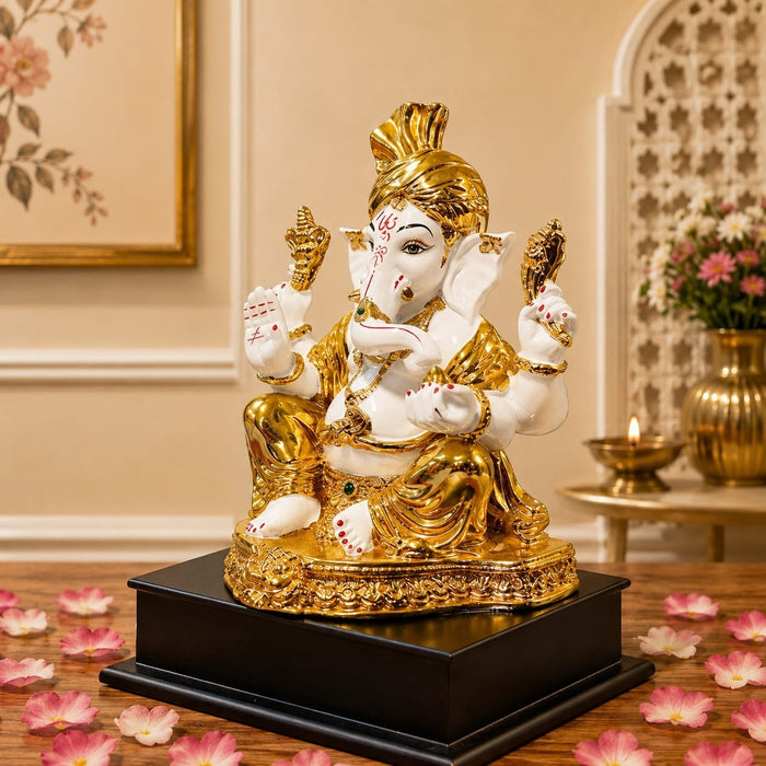 High-resolution craftsmanship detail shot displaying intricate ornamental work on White and Gold Ganesha Resin Idol with Red Tilak (10.5 Inch)