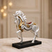 A close-up detail shot of the White and Gold Horse Figurine focusing on the artisanal carving and rich color.