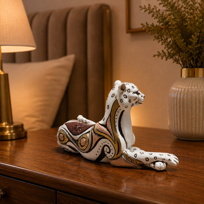 The detailed back view of the White and Gold Leopard Figurine showing the intricate texture of the material.