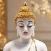 A direct front-facing view of the White Meditating Buddha Idol showcasing its vibrant details and premium finish.