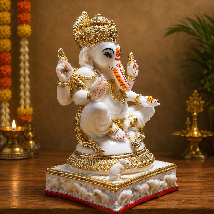 A close-up detail shot of the White and Red Ganesha Idol focusing on the artisanal carving and rich color.