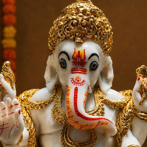 The White and Red Ganesha Idol beautifully styled in a modern home interior setting to inspire decor placement.