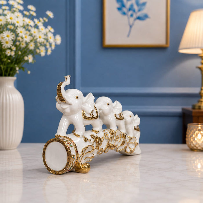 White Resin Elephant Family on Ornate Tusk Showpiece (13 Inch) - View 3