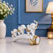 White Resin Elephant Family on Ornate Tusk Showpiece (13 Inch) - View 2